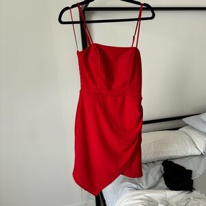 Red asymmetric mini dress with a zip at the back